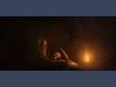 painting of a mystic writing at night, candle light